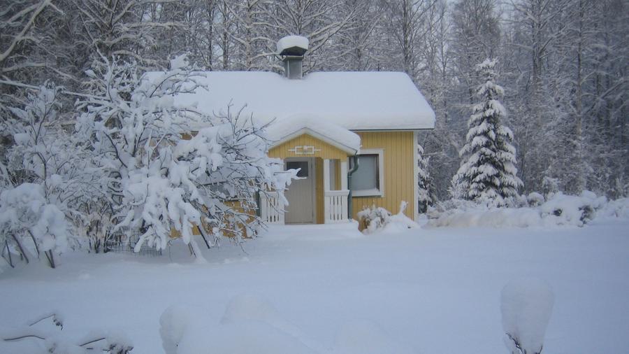 Fritidshus i snö