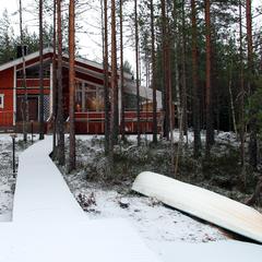 Fritidshus i snö